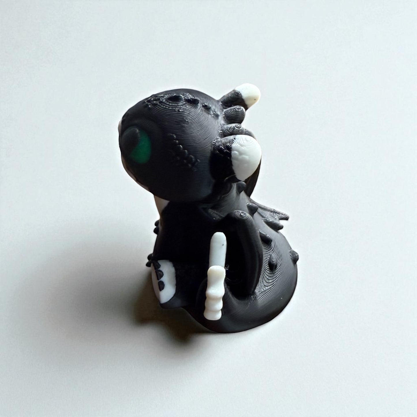 Toothless the Night Fury – Adorable Black Dragon Figurine with Green Eyes