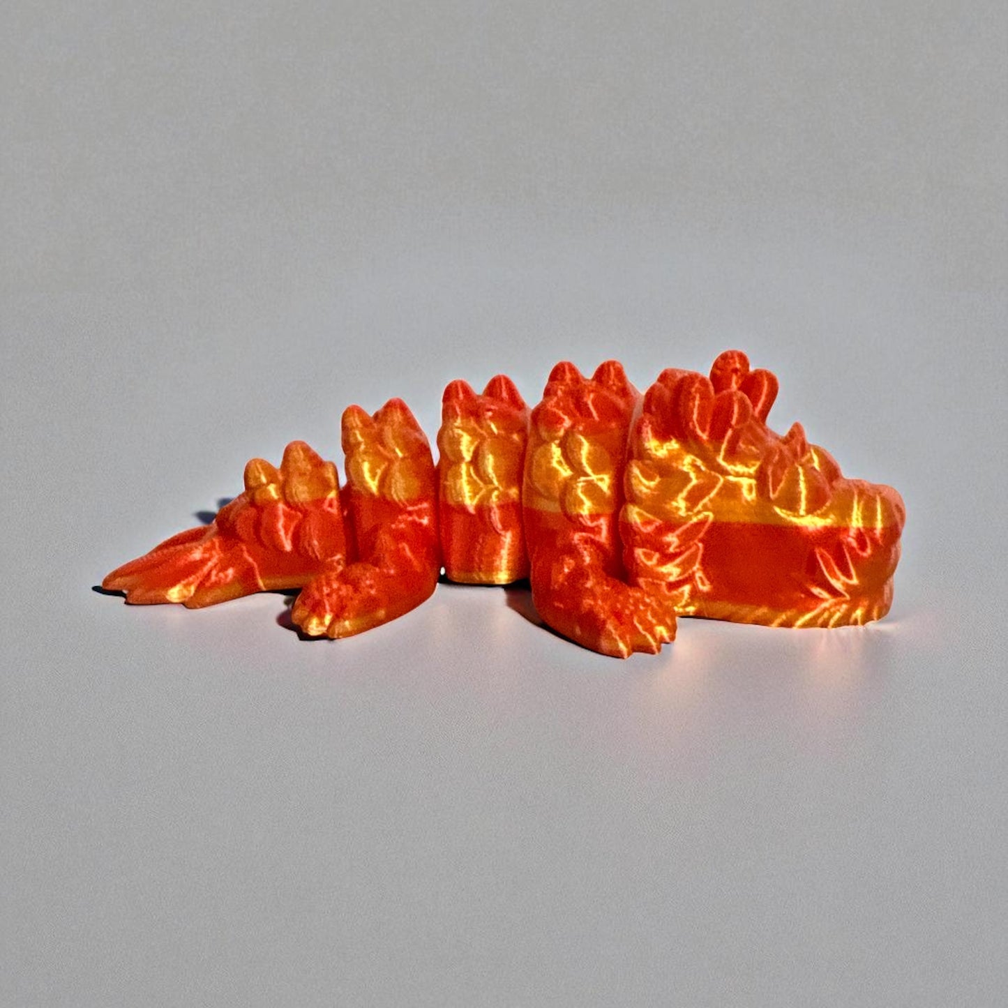 Baby Dragon Figurine Fiery Charm for Your Collection - Orange and Yellow Design