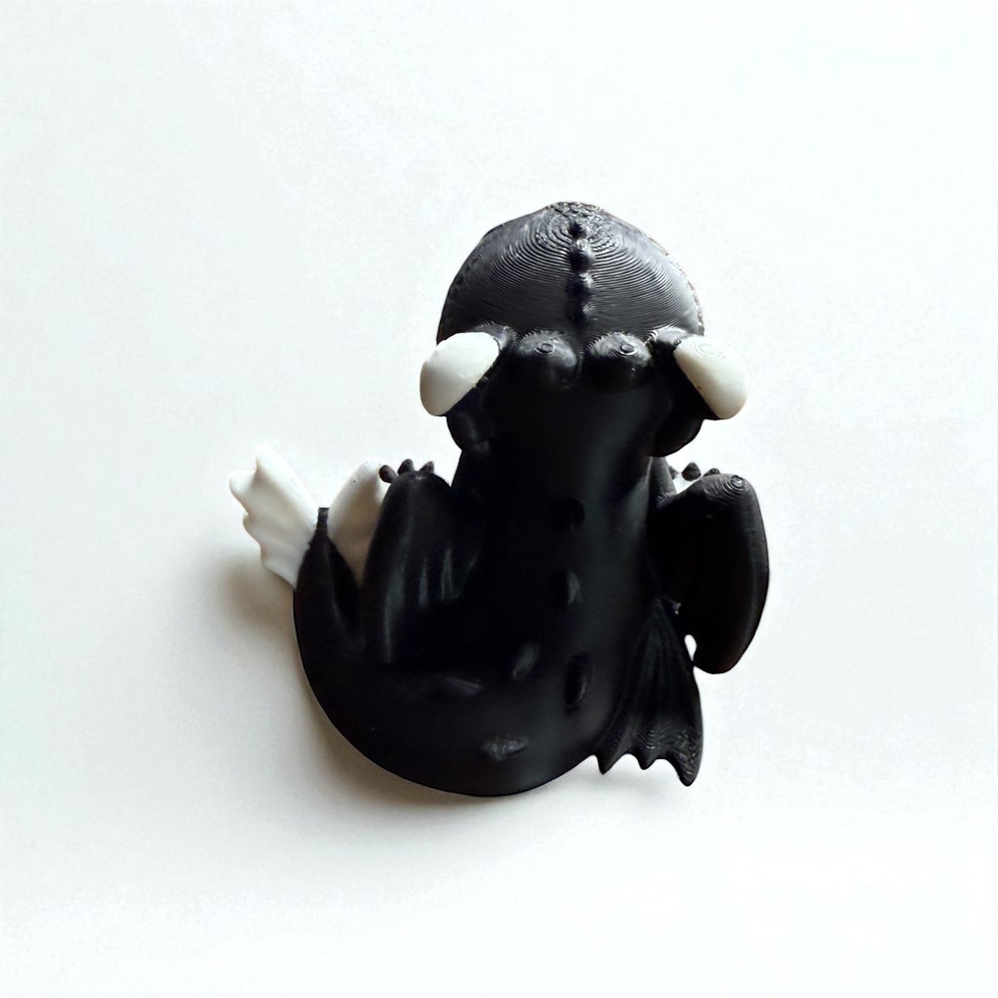 Toothless the Night Fury – Adorable Black Dragon Figurine with Green Eyes