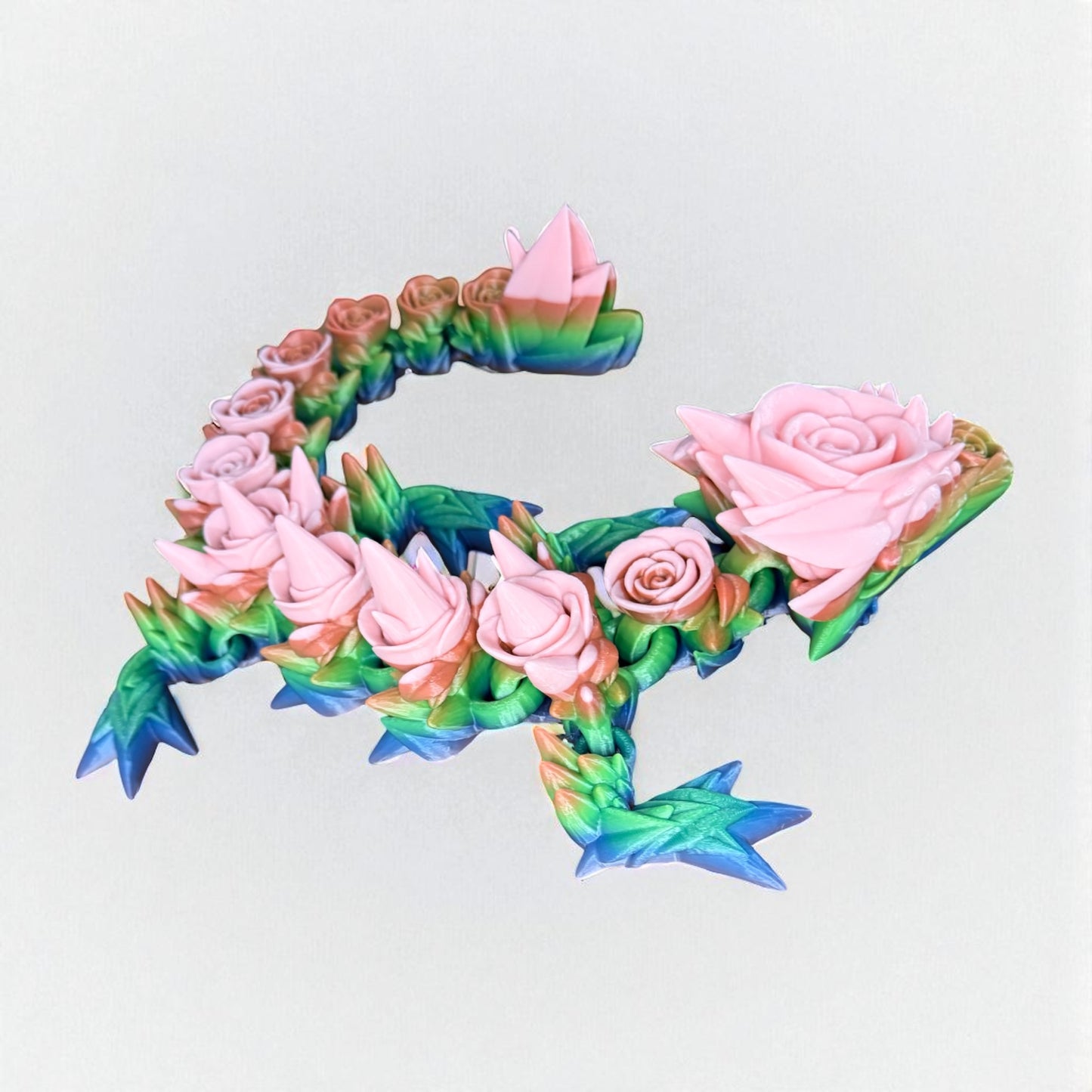 Majestic Rainbow Rose Dragon – Handcrafted in Vivid Detail