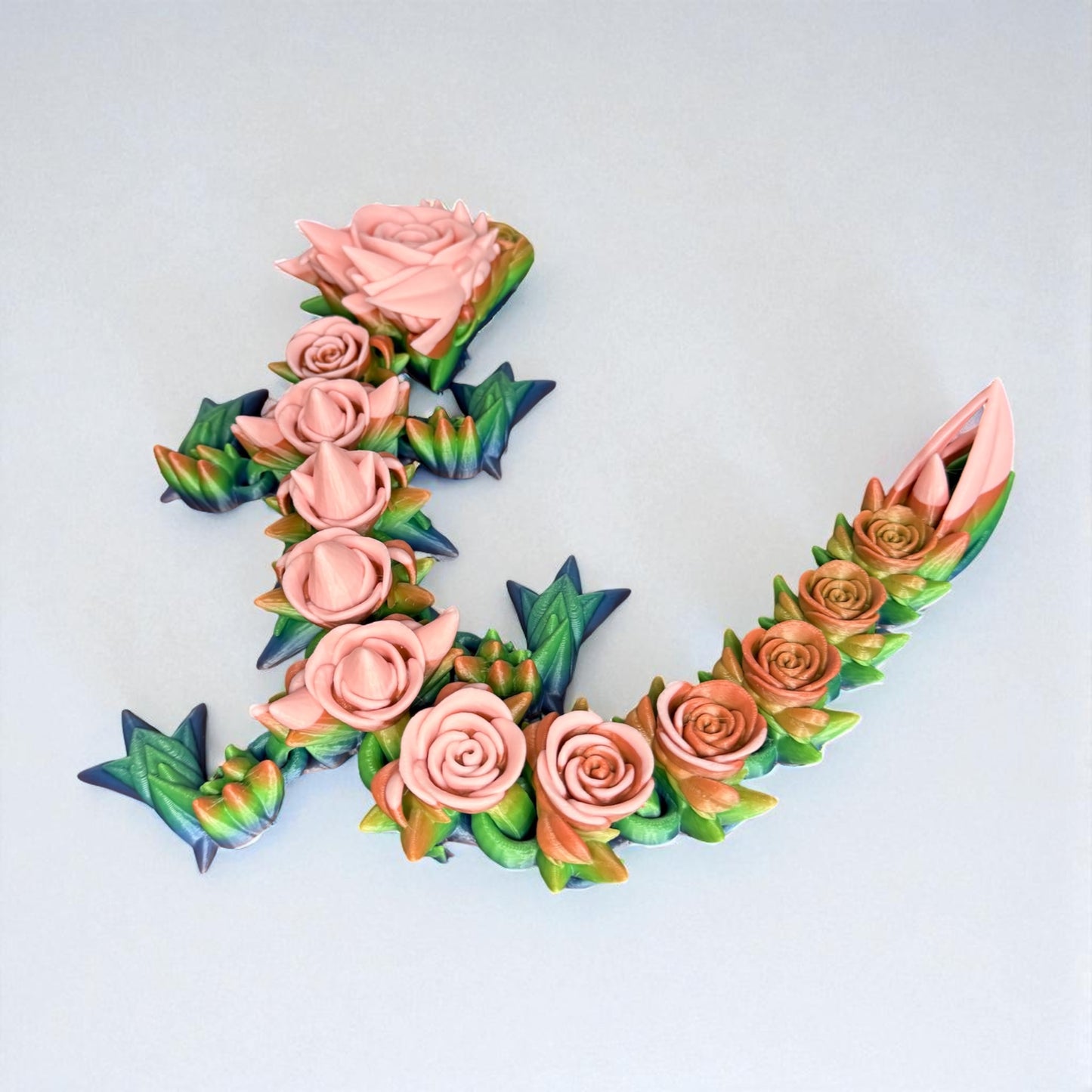 Majestic Rainbow Rose Dragon – Handcrafted in Vivid Detail